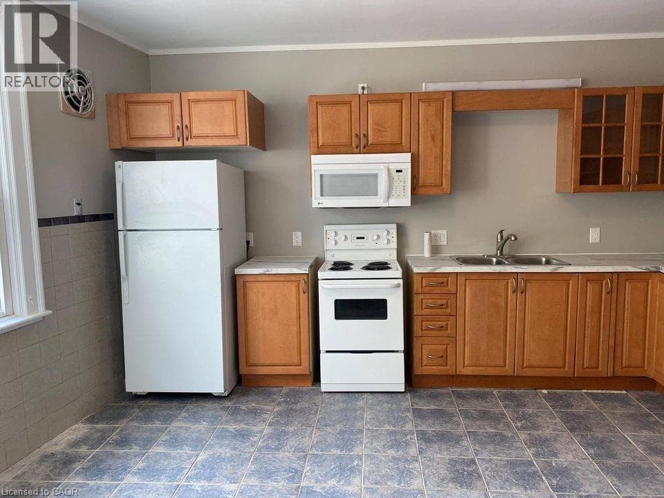 Multi-family at 249 CHURCH Street, St. Catharines, Ontario - Photo 2 - RE/MAX Garden City Realty