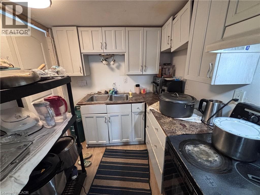 Single Family at 6413 MONROE Street, Niagara Falls, Ontario - Photo 4 - RE/MAX Garden City Realty