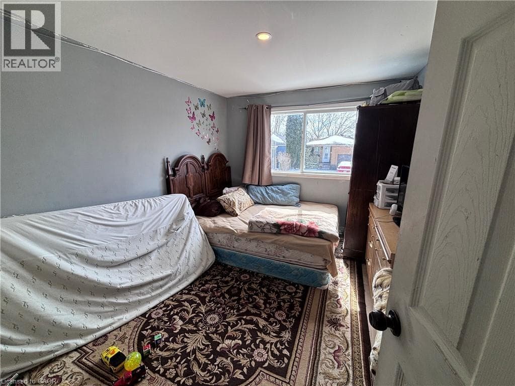 Single Family at 6413 MONROE Street, Niagara Falls, Ontario - Photo 5 - RE/MAX Garden City Realty