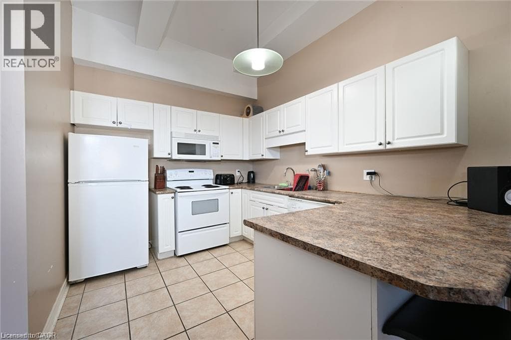 Single Family at 105- 6365 DRUMMOND Road, Niagara Falls, Ontario - Photo 6 - RE/MAX Garden City Realty
