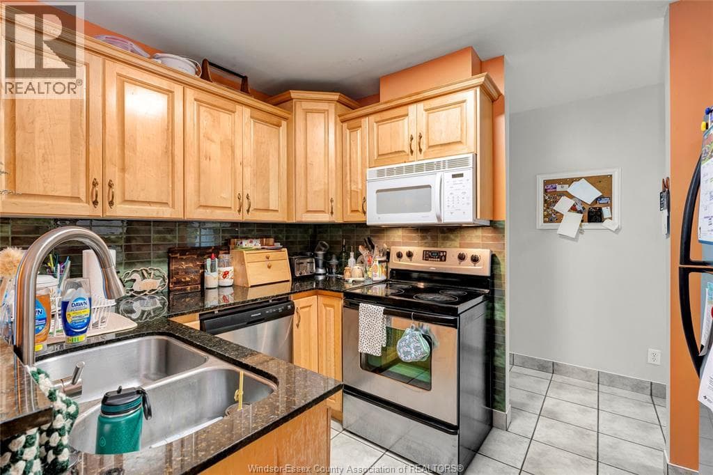 Single Family at 7B- 540 OUELLETTE, Windsor, Ontario - Photo 3 - RE/MAX Garden City Realty