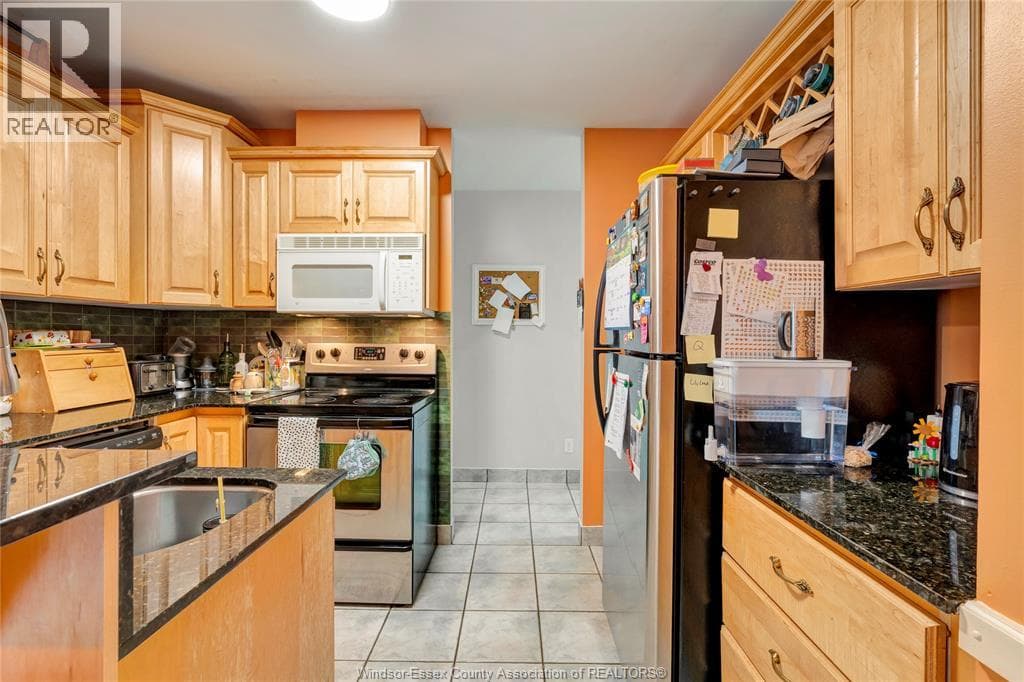 Single Family at 7B- 540 OUELLETTE, Windsor, Ontario - Photo 6 - RE/MAX Garden City Realty