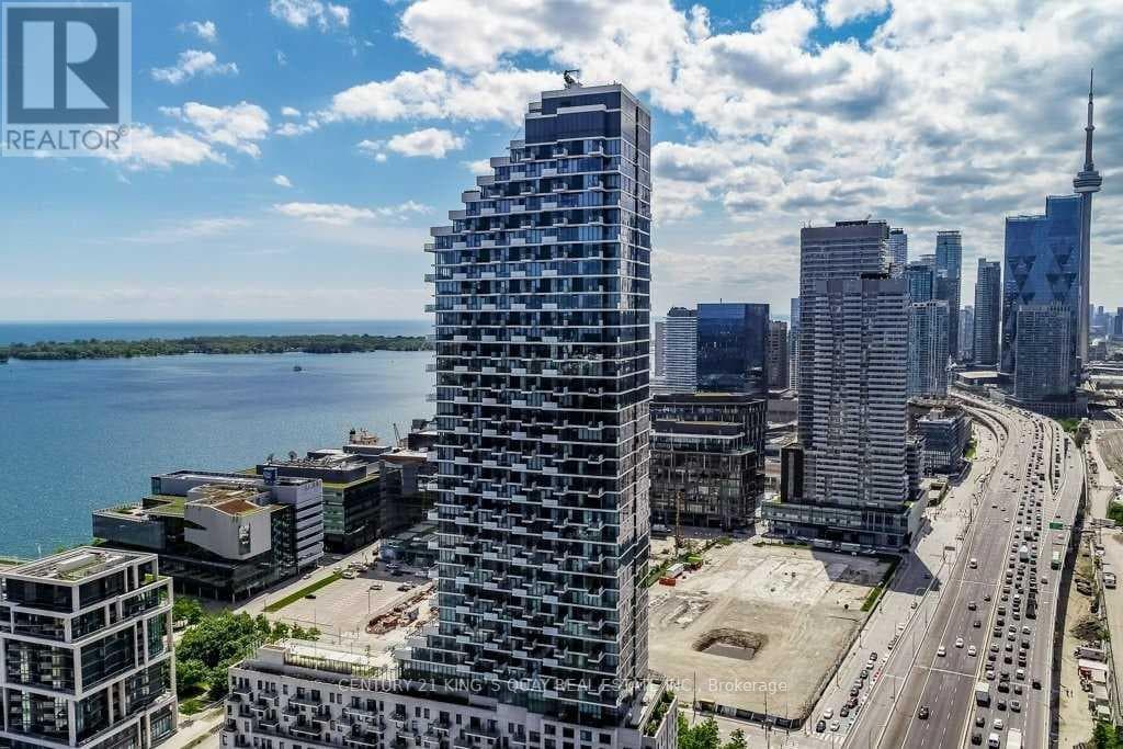 Single Family at 1211- 16 Bonnycastle Street, Toronto (Waterfront Communities), Ontario - Photo 1 - RE/MAX Garden City Realty