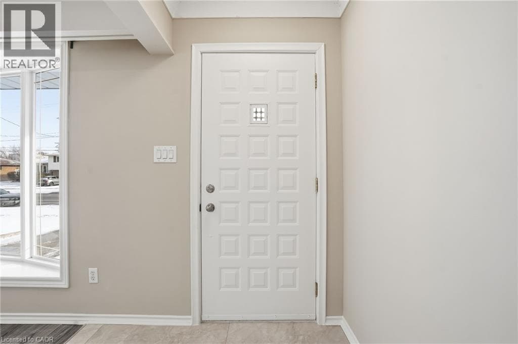 Multi-family at 93 WELLINGTON Street, Welland, Ontario - Photo 3 - RE/MAX Garden City Realty
