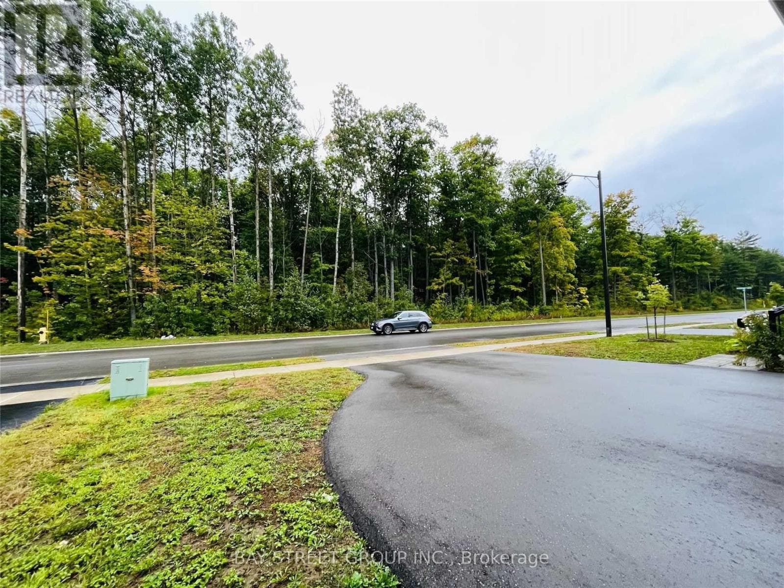 Single Family at 25 Mcisaac Drive, Springwater (Centre Vespra), Ontario - Photo 2 - RE/MAX Garden City Realty