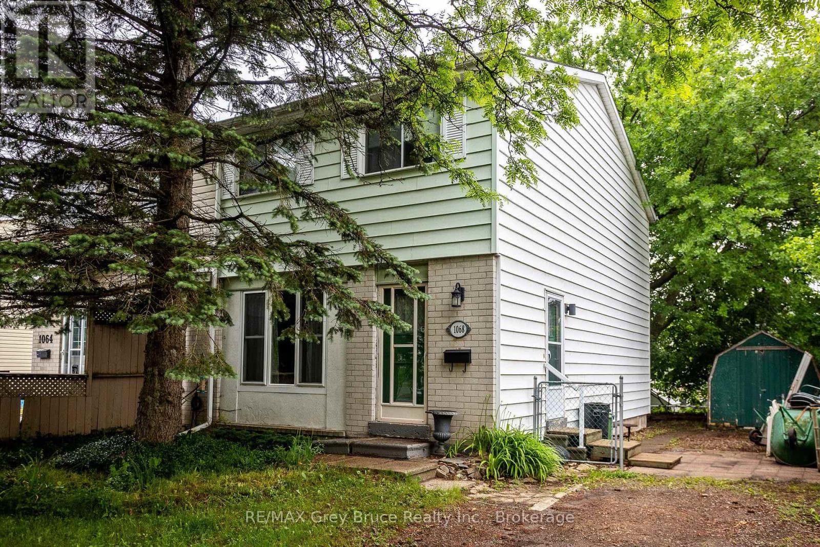 Single Family at 1068 11th Street, Owen Sound, Ontario - Photo 1 - RE/MAX Garden City Realty