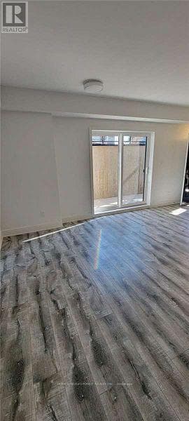 Single Family at 102- 6065 McLEOD Road, Niagara Falls (Arad/Fallsview), Ontario - Photo 4 - RE/MAX Garden City Realty