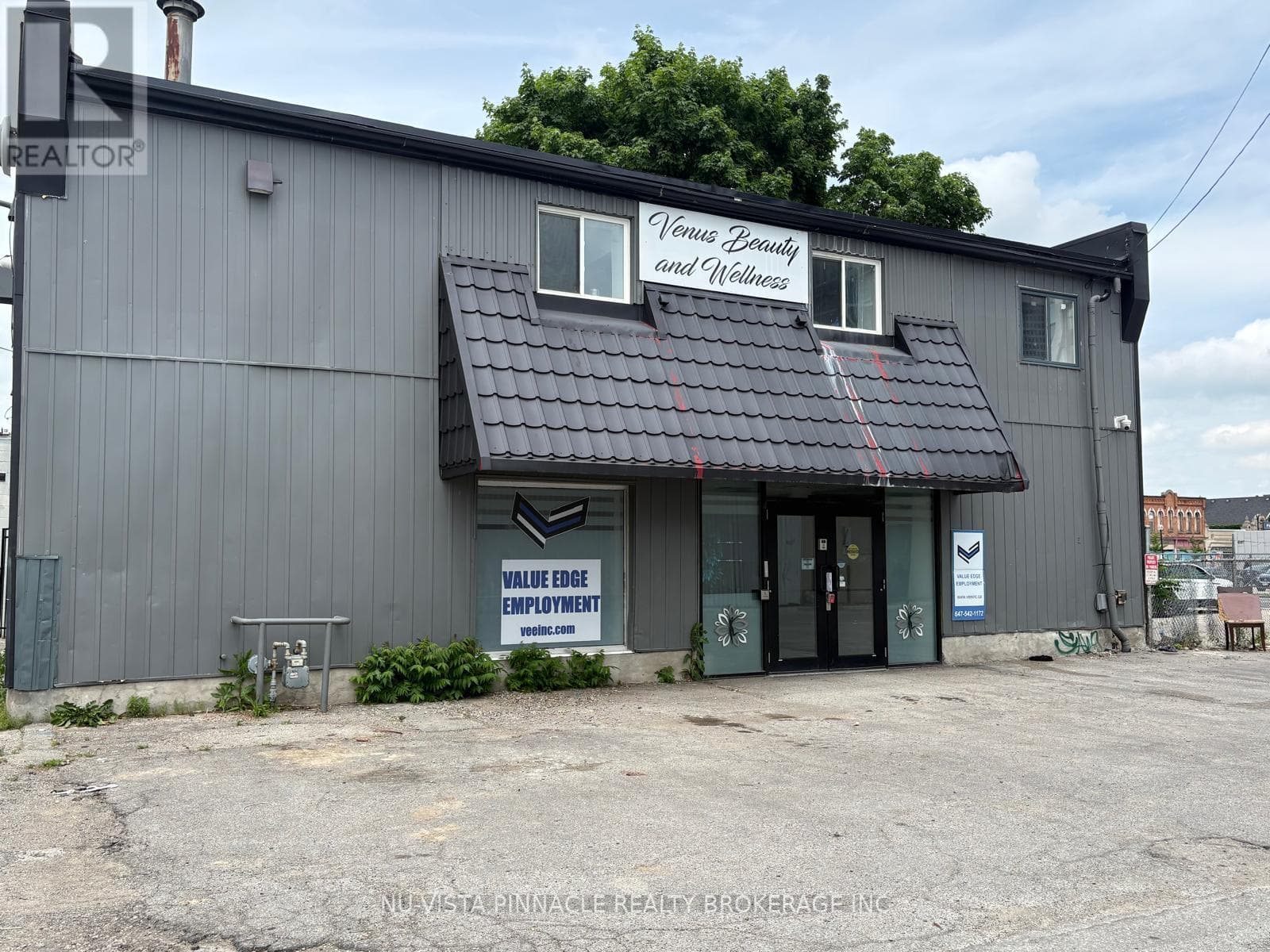 Retail at 389 LYLE Street, London East (East L), Ontario - Photo 2 - RE/MAX Garden City Realty