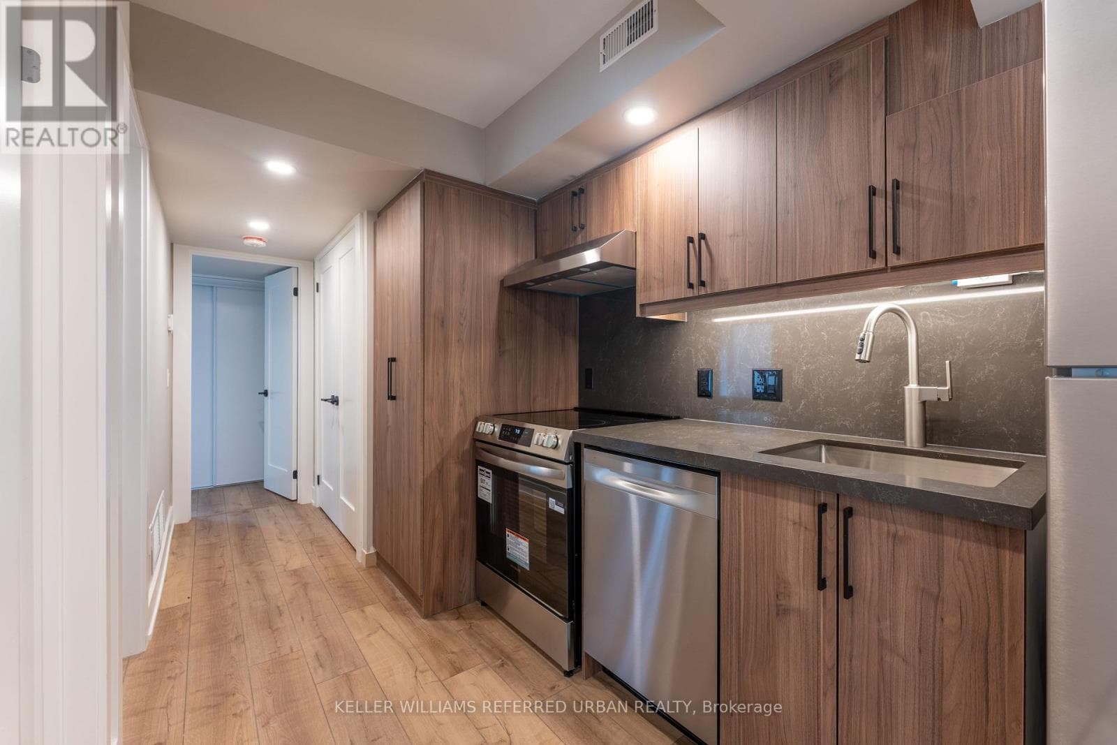 Single Family at 2- 352 Jones Avenue, Toronto (Blake-Jones), Ontario - Photo 2 - RE/MAX Garden City Realty