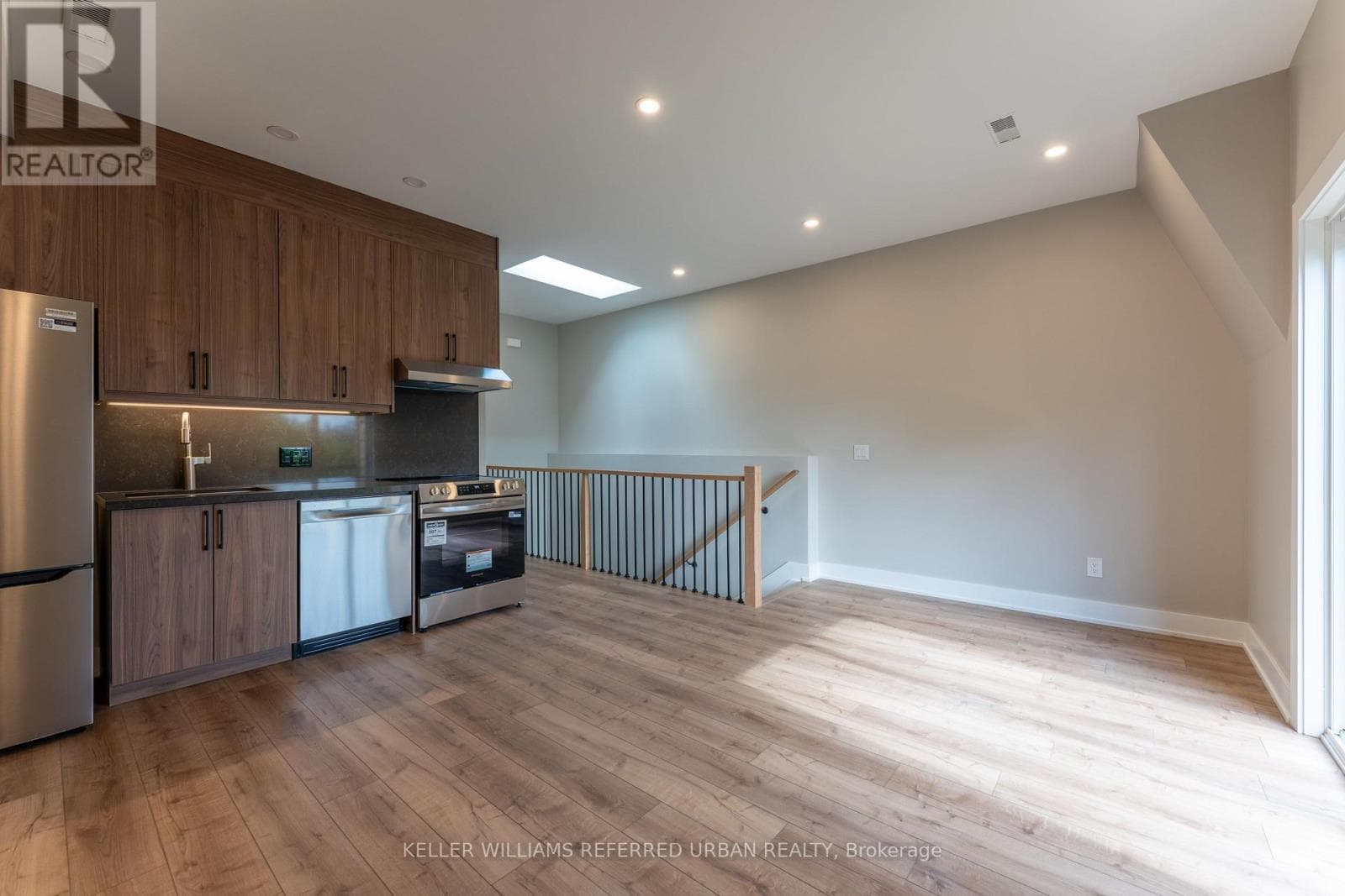 Single Family at 4- 352 Jones Avenue, Toronto (Blake-Jones), Ontario - Photo 2 - RE/MAX Garden City Realty