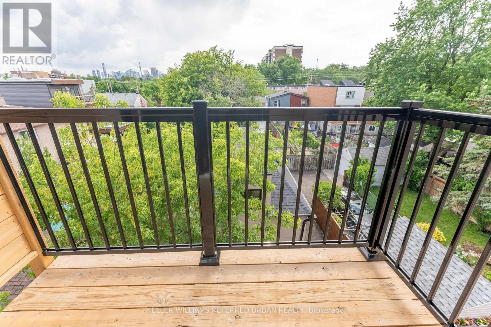 Single Family at 4- 352 Jones Avenue, Toronto (Blake-Jones), Ontario - Photo 4 - RE/MAX Garden City Realty