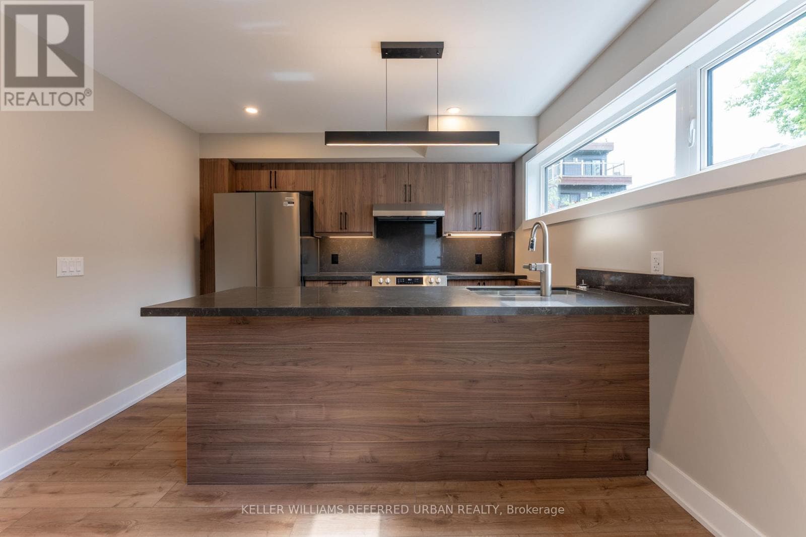 Single Family at 5- 352 Jones Avenue, Toronto (Blake-Jones), Ontario - Photo 2 - RE/MAX Garden City Realty