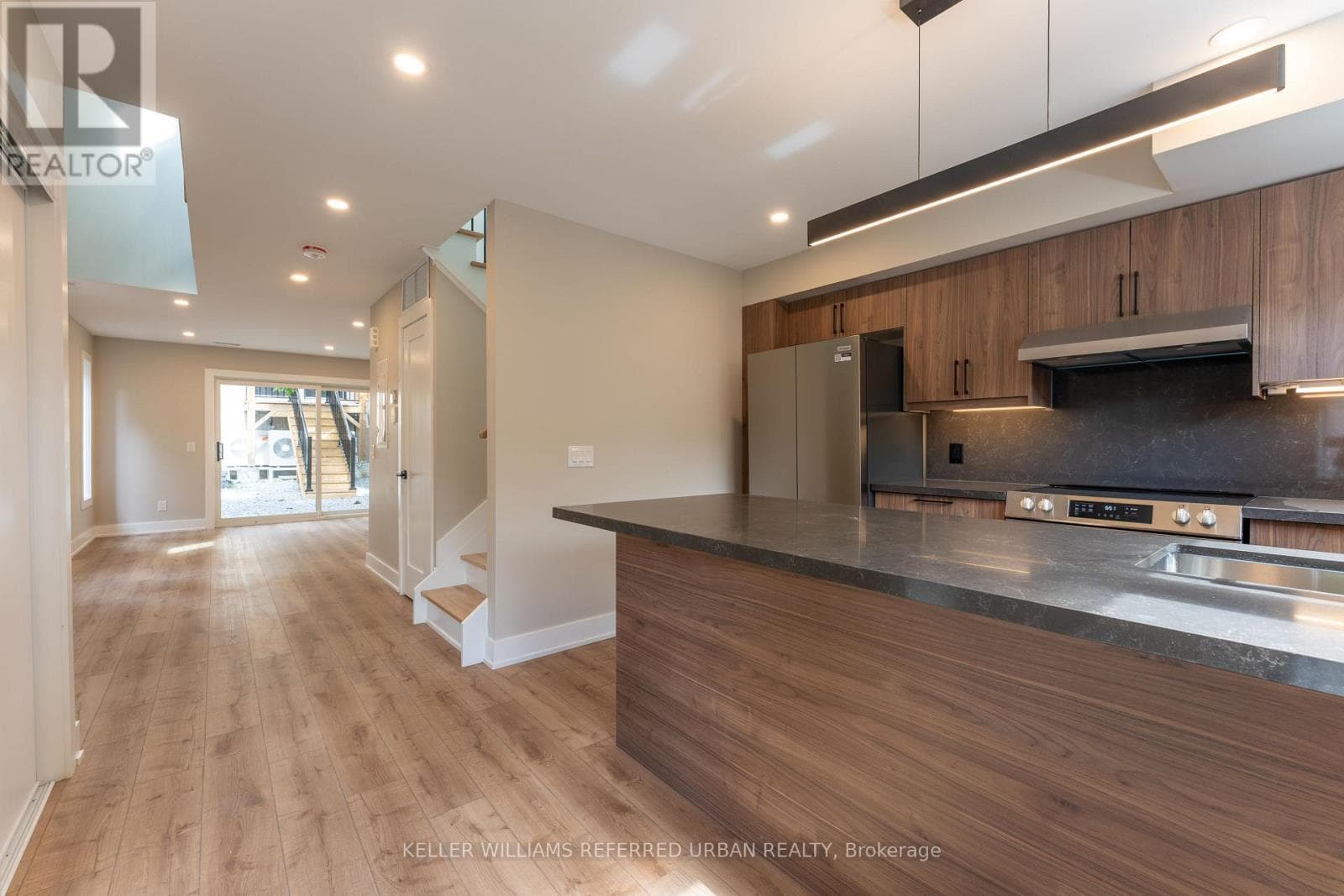 Single Family at 5- 352 Jones Avenue, Toronto (Blake-Jones), Ontario - Photo 3 - RE/MAX Garden City Realty