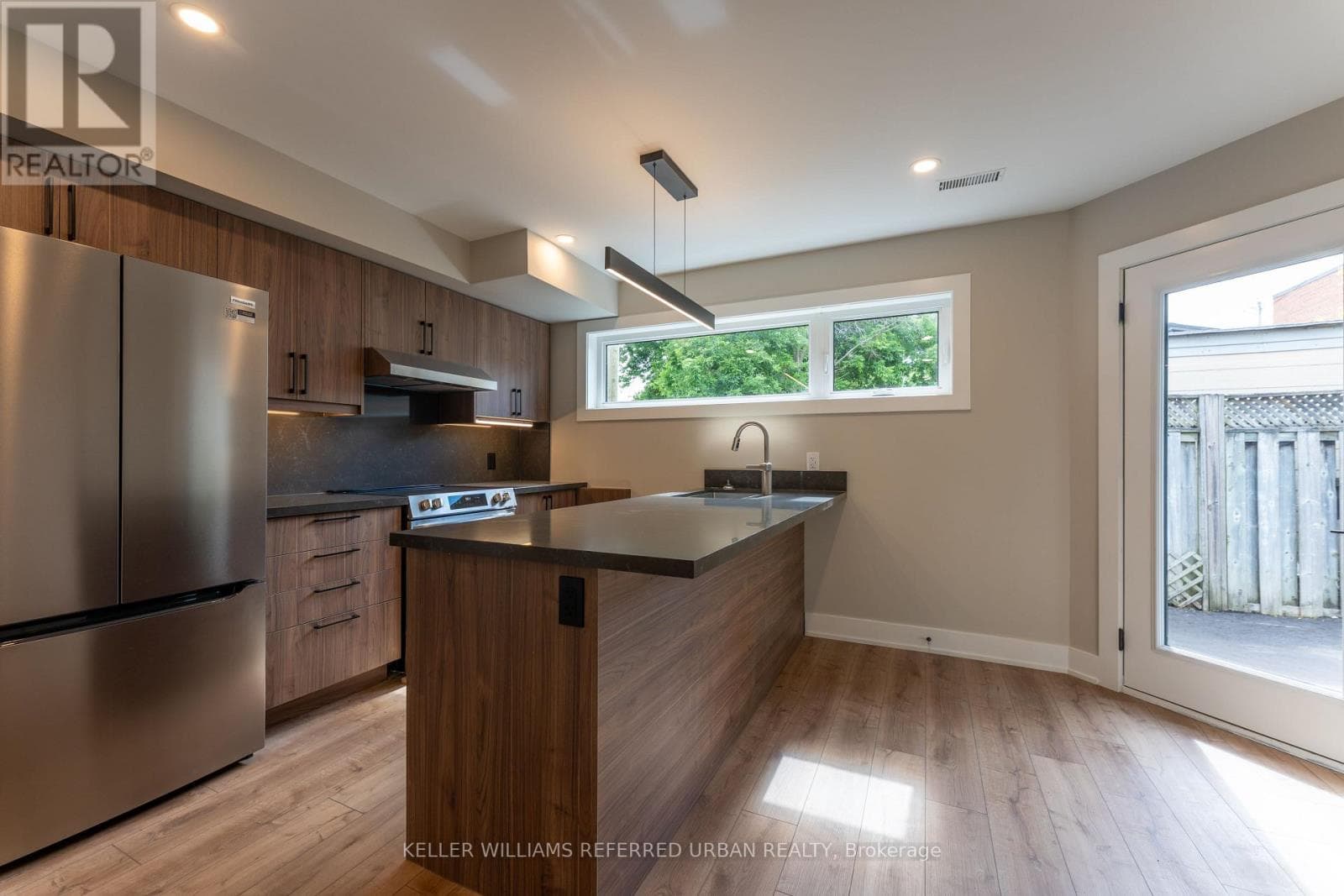 Single Family at 5- 352 Jones Avenue, Toronto (Blake-Jones), Ontario - Photo 4 - RE/MAX Garden City Realty