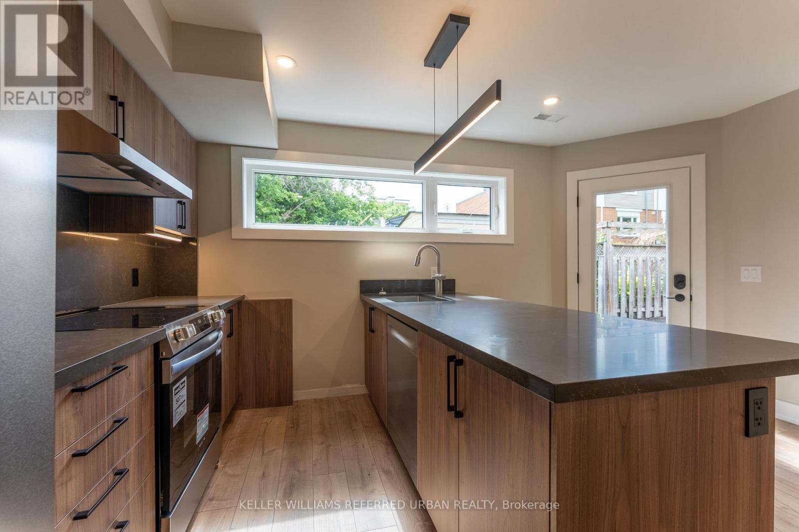 Single Family at 5- 352 Jones Avenue, Toronto (Blake-Jones), Ontario - Photo 5 - RE/MAX Garden City Realty