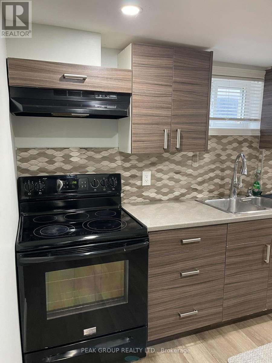 Multi-family at Lower- 4961 Armoury Street, Niagara Falls (Cherrywood), Ontario - Photo 4 - RE/MAX Garden City Realty