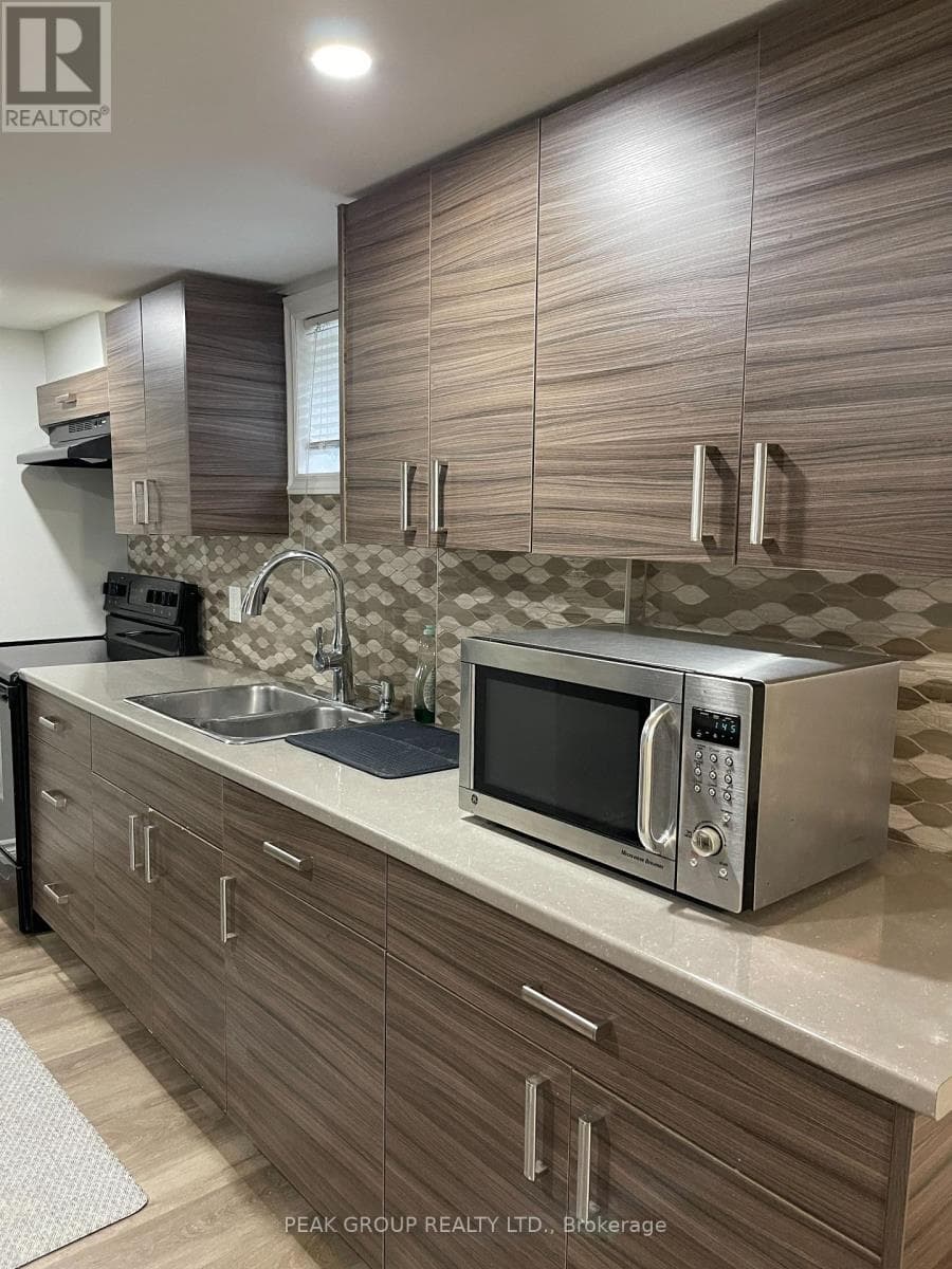 Multi-family at Lower- 4961 Armoury Street, Niagara Falls (Cherrywood), Ontario - Photo 5 - RE/MAX Garden City Realty