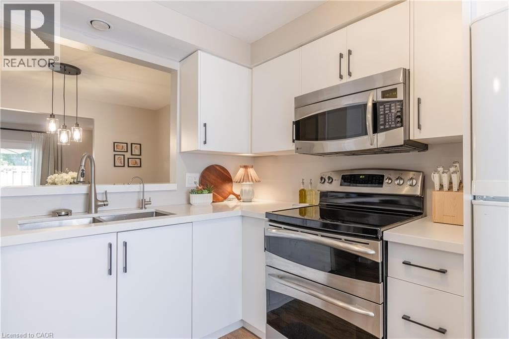 Single Family at 77- 6767 THOROLD STONE Road, Niagara Falls, Ontario - Photo 6 - RE/MAX Garden City Realty