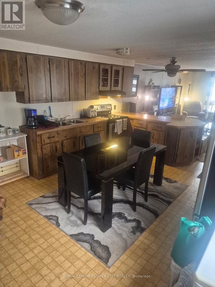 Single Family at 5- 3233 Derry Road, Mississauga (Malton), Ontario - Photo 6 - RE/MAX Garden City Realty