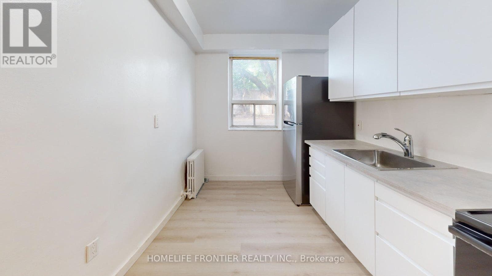Multi-family at #2- 1110 Weston Road, Toronto (Mount Dennis), Ontario - Photo 5 - RE/MAX Garden City Realty