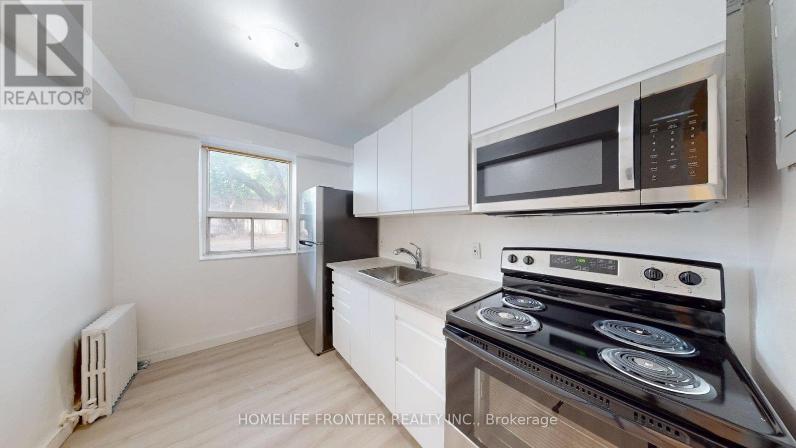 Multi-family at #2- 1110 Weston Road, Toronto (Mount Dennis), Ontario - Photo 6 - RE/MAX Garden City Realty