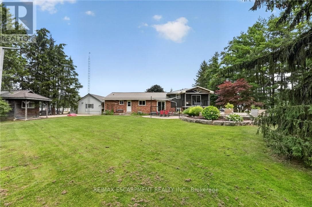 Single Family at 74066 WELLANDPORT Road, Wainfleet (Marshville/Winger), Ontario - Photo 2 - RE/MAX Garden City Realty