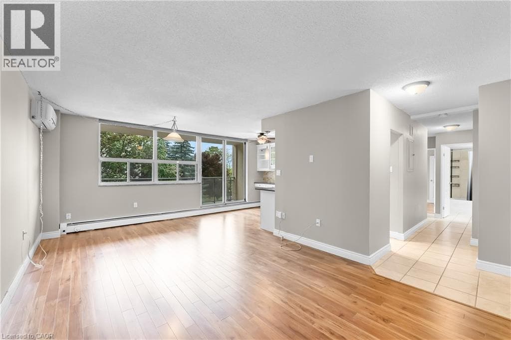 Single Family at 407- 6390 HUGGINS Street, Niagara Falls, Ontario - Photo 2 - RE/MAX Garden City Realty