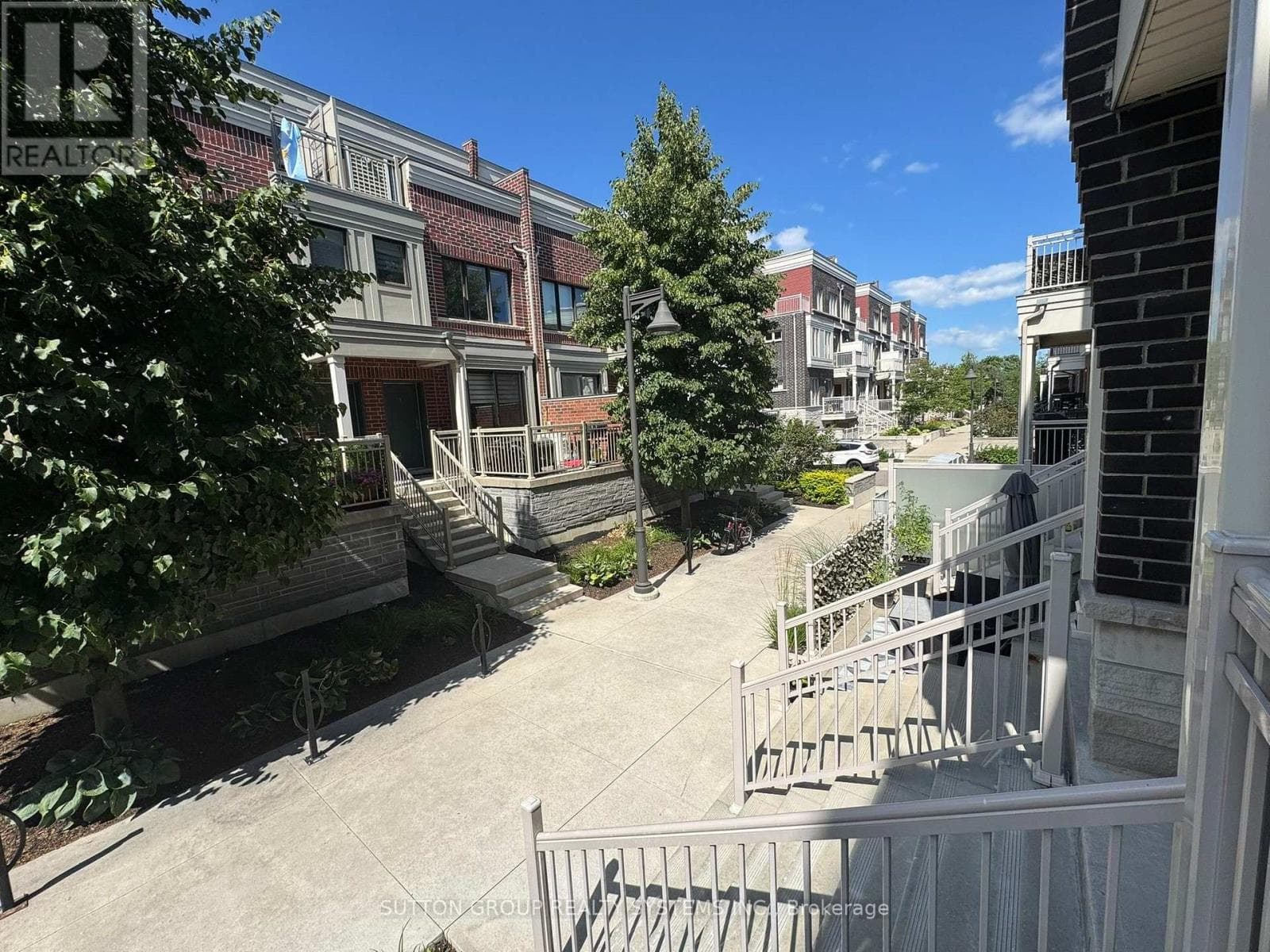 Single Family at 10- 90 Eastwood Park Gardens, Toronto (Long Branch), Ontario - Photo 2 - RE/MAX Garden City Realty