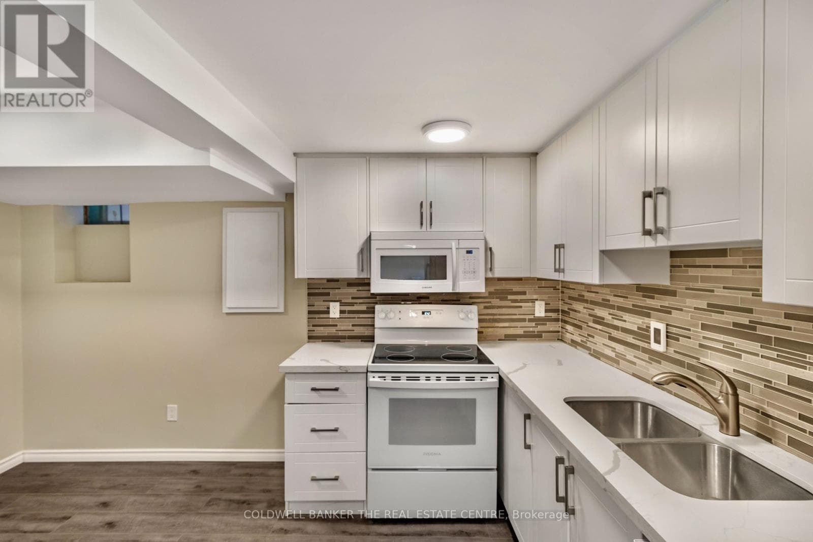 Single Family at 5 Rutherford Avenue, Toronto (Mount Dennis), Ontario - Photo 4 - RE/MAX Garden City Realty