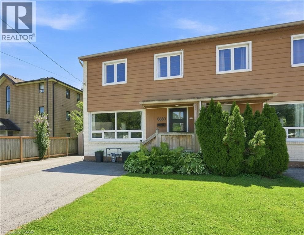 Single Family at 6680 MCLEOD Road, Niagara Falls, Ontario - Photo 2 - RE/MAX Garden City Realty