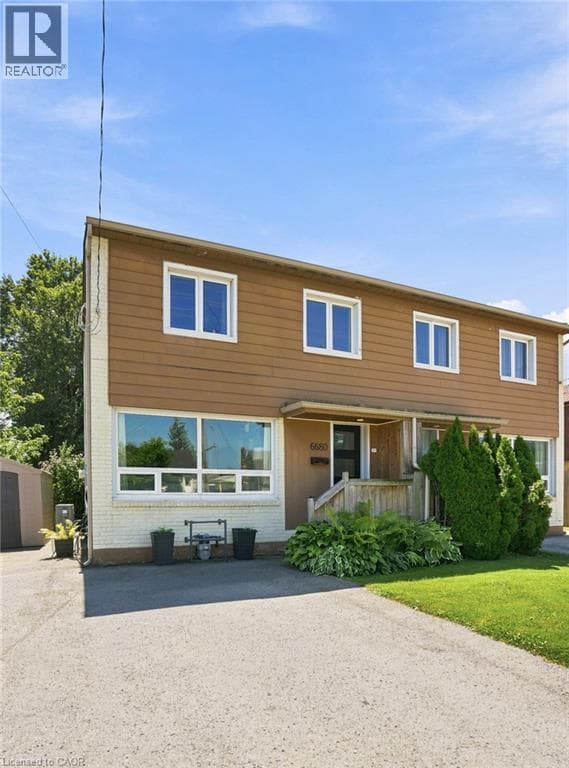 Single Family at 6680 MCLEOD Road, Niagara Falls, Ontario - Photo 3 - RE/MAX Garden City Realty