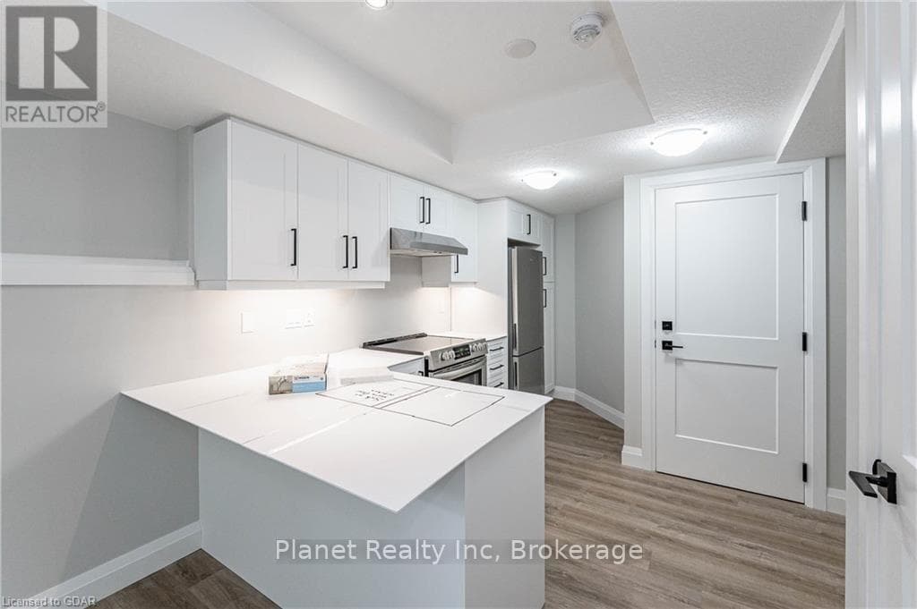 Single Family at 2- 330 Exhibition Street, Guelph (Exhibition Park), Ontario - Photo 2 - RE/MAX Garden City Realty