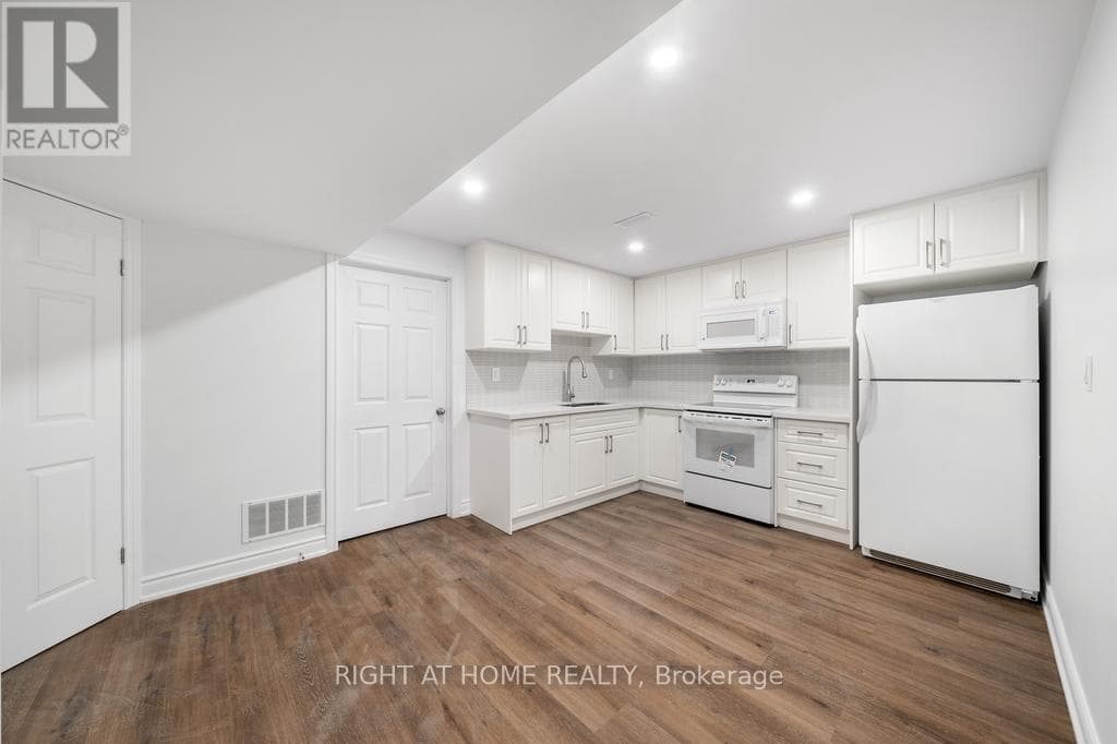 Single Family at Lower- 582 Carlyle Court, Oshawa (Donevan), Ontario - Photo 2 - RE/MAX Garden City Realty