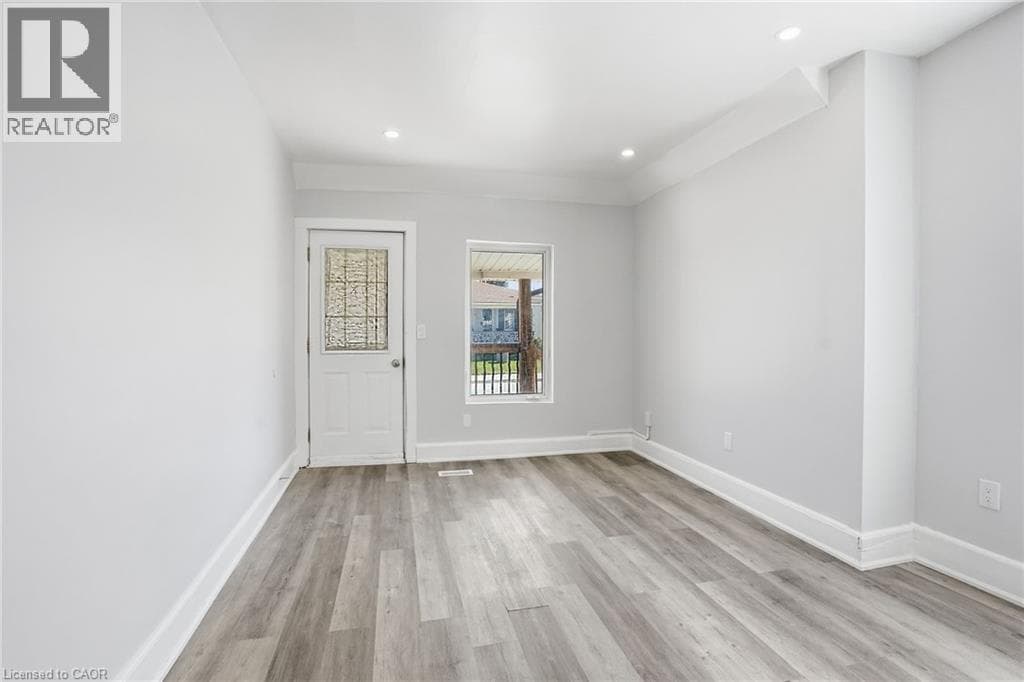 Multi-family at 5671 DESSON Avenue, Niagara Falls, Ontario - Photo 7 - RE/MAX Garden City Realty