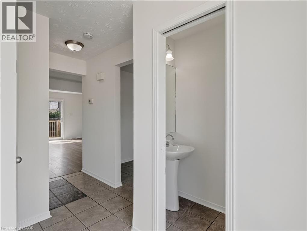 Single Family at 211 MORTON Street, Thorold, Ontario - Photo 4 - RE/MAX Garden City Realty