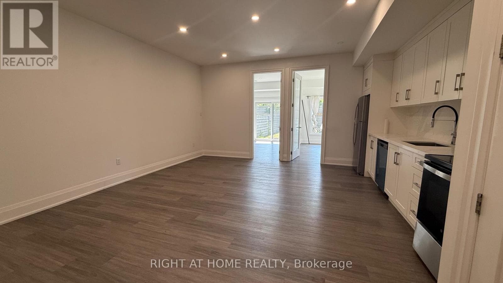 Single Family at Lower- 21 Antonio Court, Toronto (Humber Summit), Ontario - Photo 6 - RE/MAX Garden City Realty