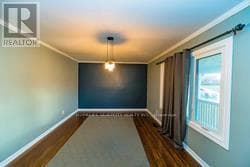 Single Family at 5254 Stanley Avenue, Niagara Falls (Cherrywood), Ontario - Photo 3 - RE/MAX Garden City Realty