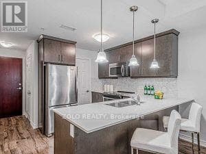 Single Family at 104- 70 stewart Street, Oakville (CO Central), Ontario - Photo 2 - RE/MAX Garden City Realty