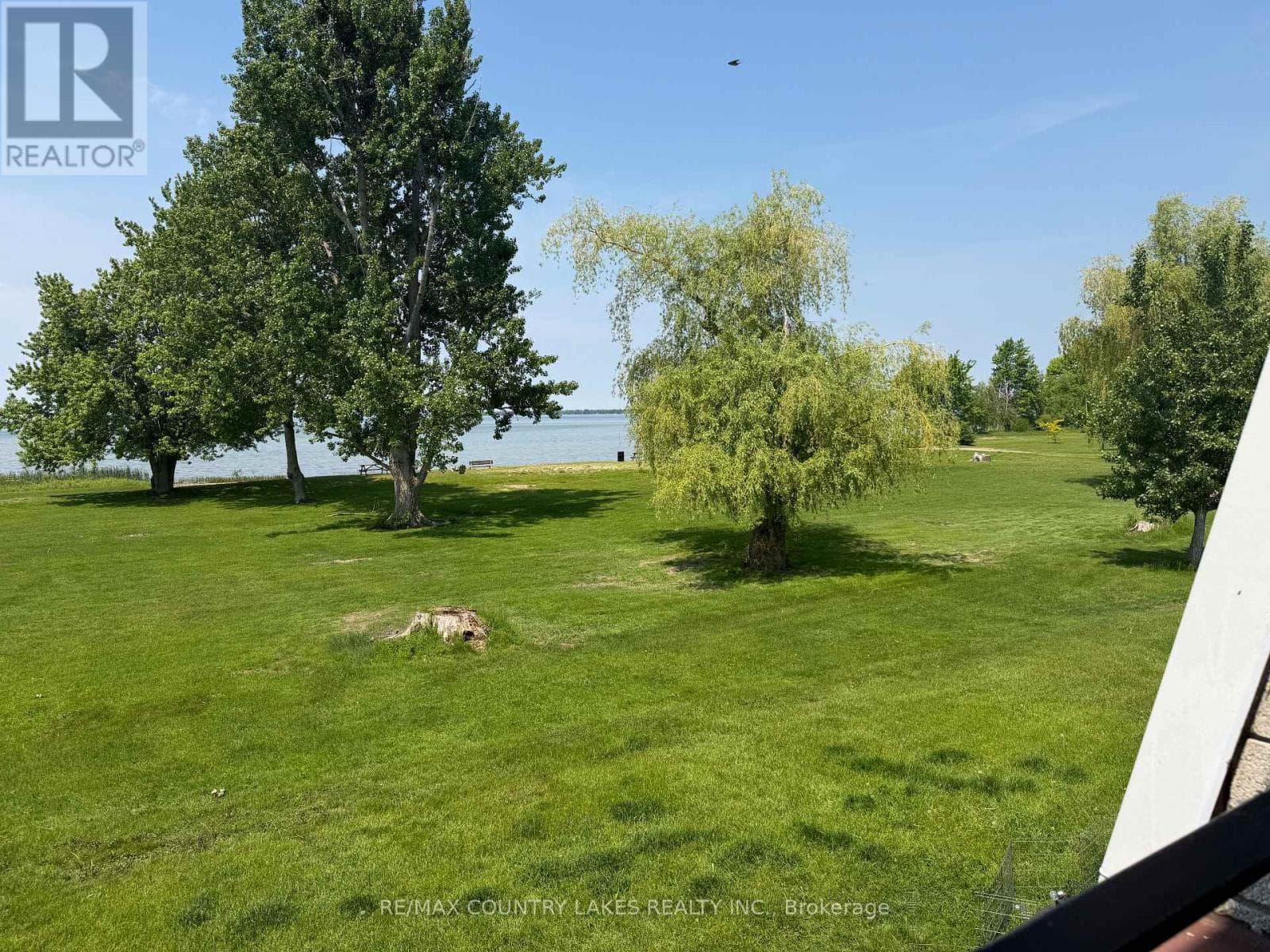 Single Family at 11- 1 Paradise Boulevard, Ramara, Ontario - Photo 2 - RE/MAX Garden City Realty