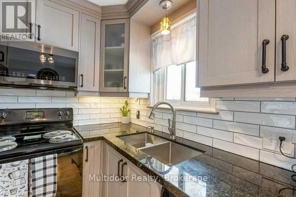 Single Family at 50 Rosalynne Avenue, Clarington (Bowmanville), Ontario - Photo 4 - RE/MAX Garden City Realty