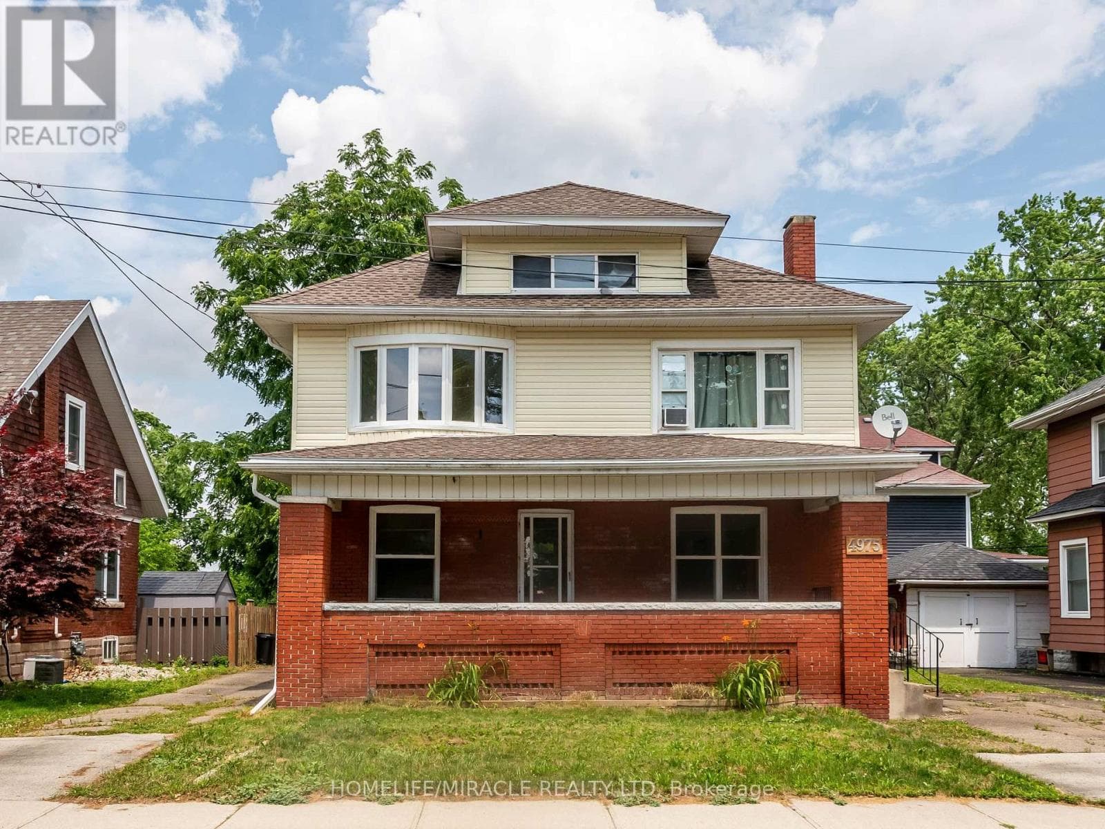 Multi-family at 1- 4975 Mcrae Street, Niagara Falls (Cherrywood), Ontario - Photo 2 - RE/MAX Garden City Realty
