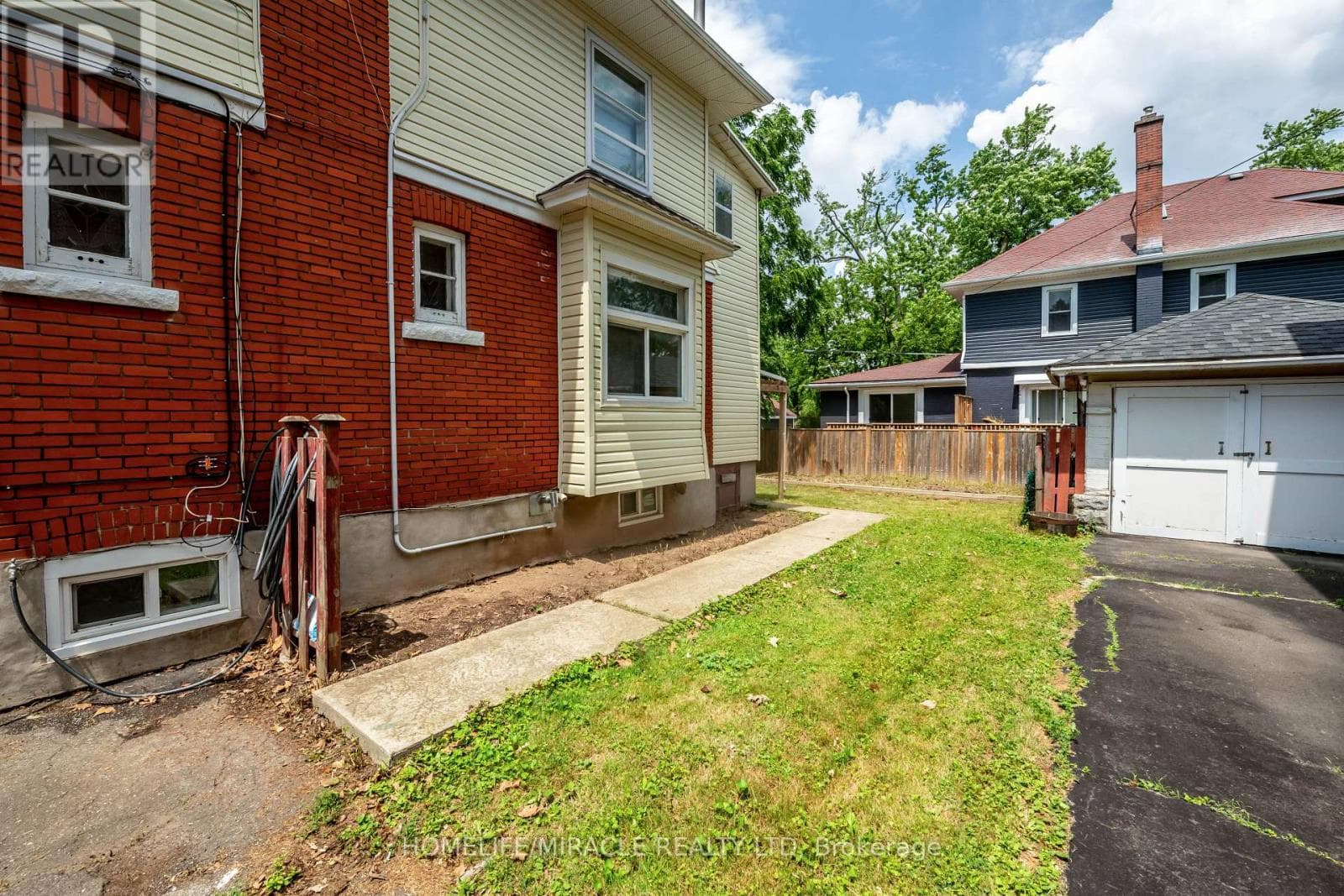 Multi-family at 1- 4975 Mcrae Street, Niagara Falls (Cherrywood), Ontario - Photo 4 - RE/MAX Garden City Realty