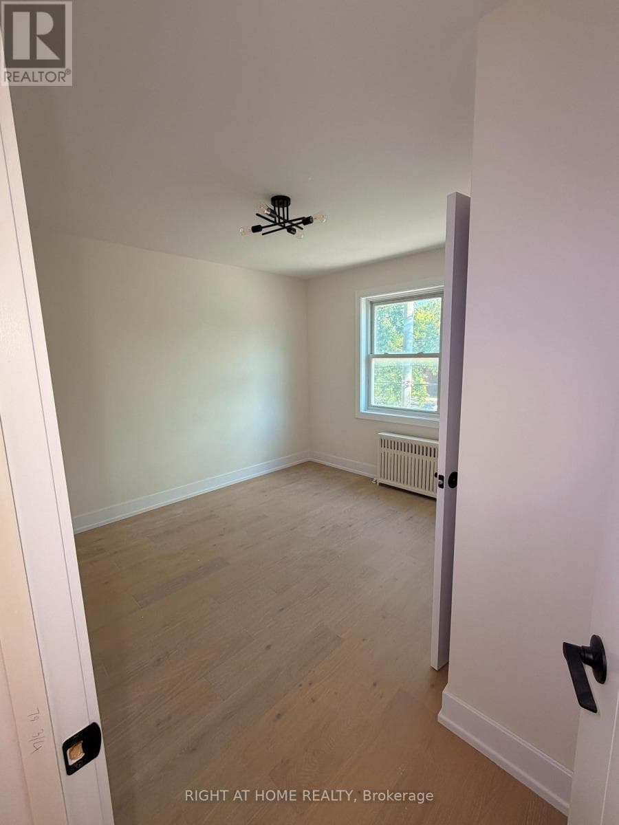 Multi-family at 201- 3384 Lake Shore Boulevard, Toronto (Long Branch), Ontario - Photo 2 - RE/MAX Garden City Realty