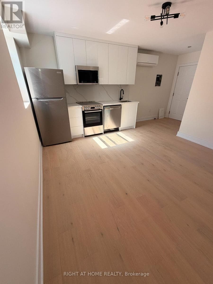 Multi-family at 201- 3384 Lake Shore Boulevard, Toronto (Long Branch), Ontario - Photo 5 - RE/MAX Garden City Realty