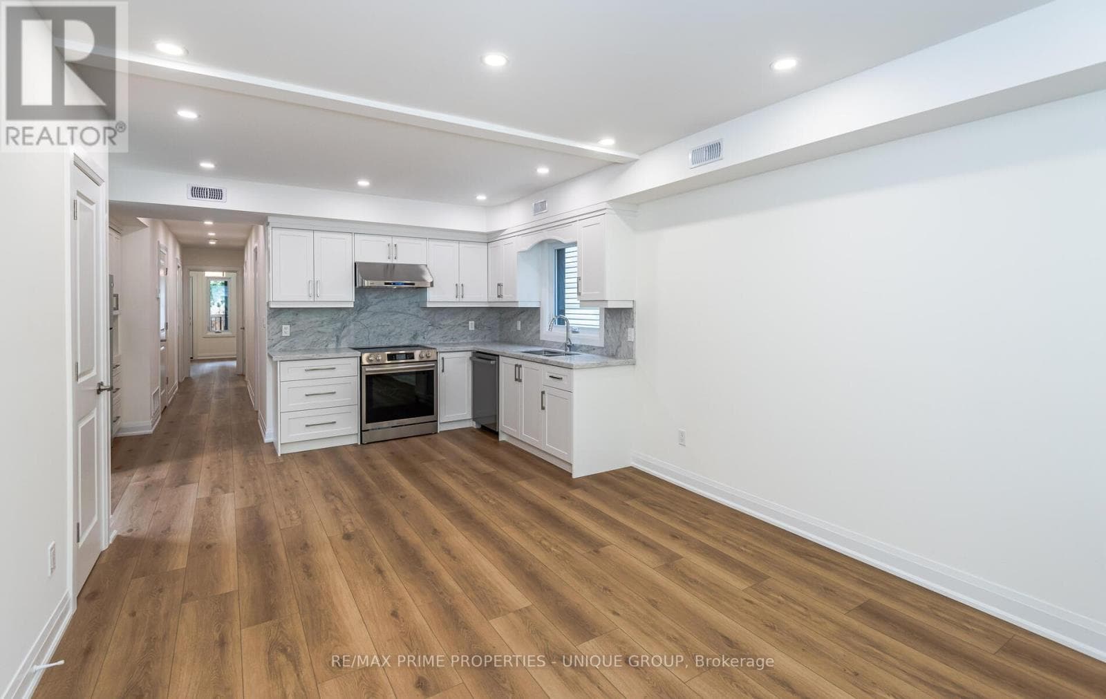 Single Family at 2- 45 Astoria Avenue, Toronto (Mount Dennis), Ontario - Photo 7 - RE/MAX Garden City Realty
