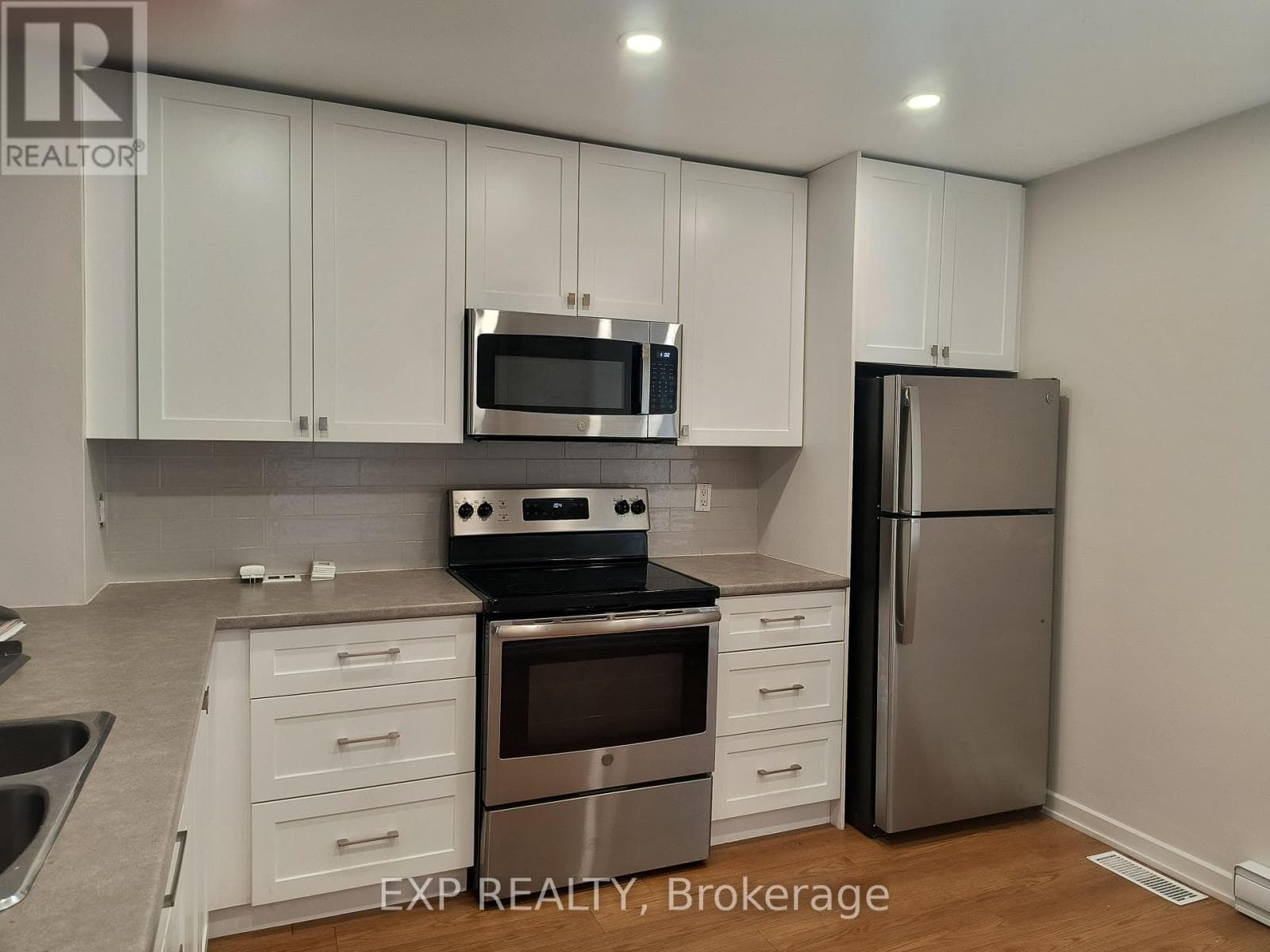 Single Family at 002- 1310 Richmond Road, Ottawa, Ontario - Photo 2 - RE/MAX Garden City Realty