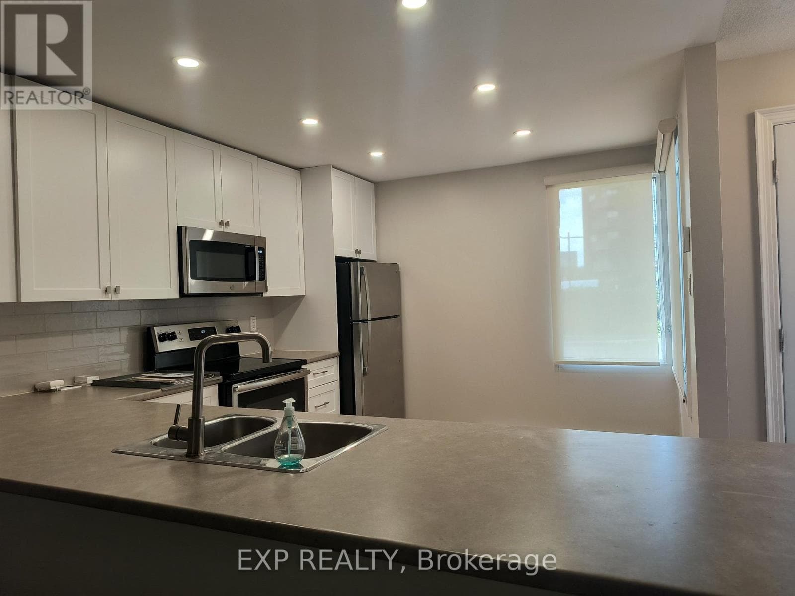 Single Family at 002- 1310 Richmond Road, Ottawa, Ontario - Photo 3 - RE/MAX Garden City Realty