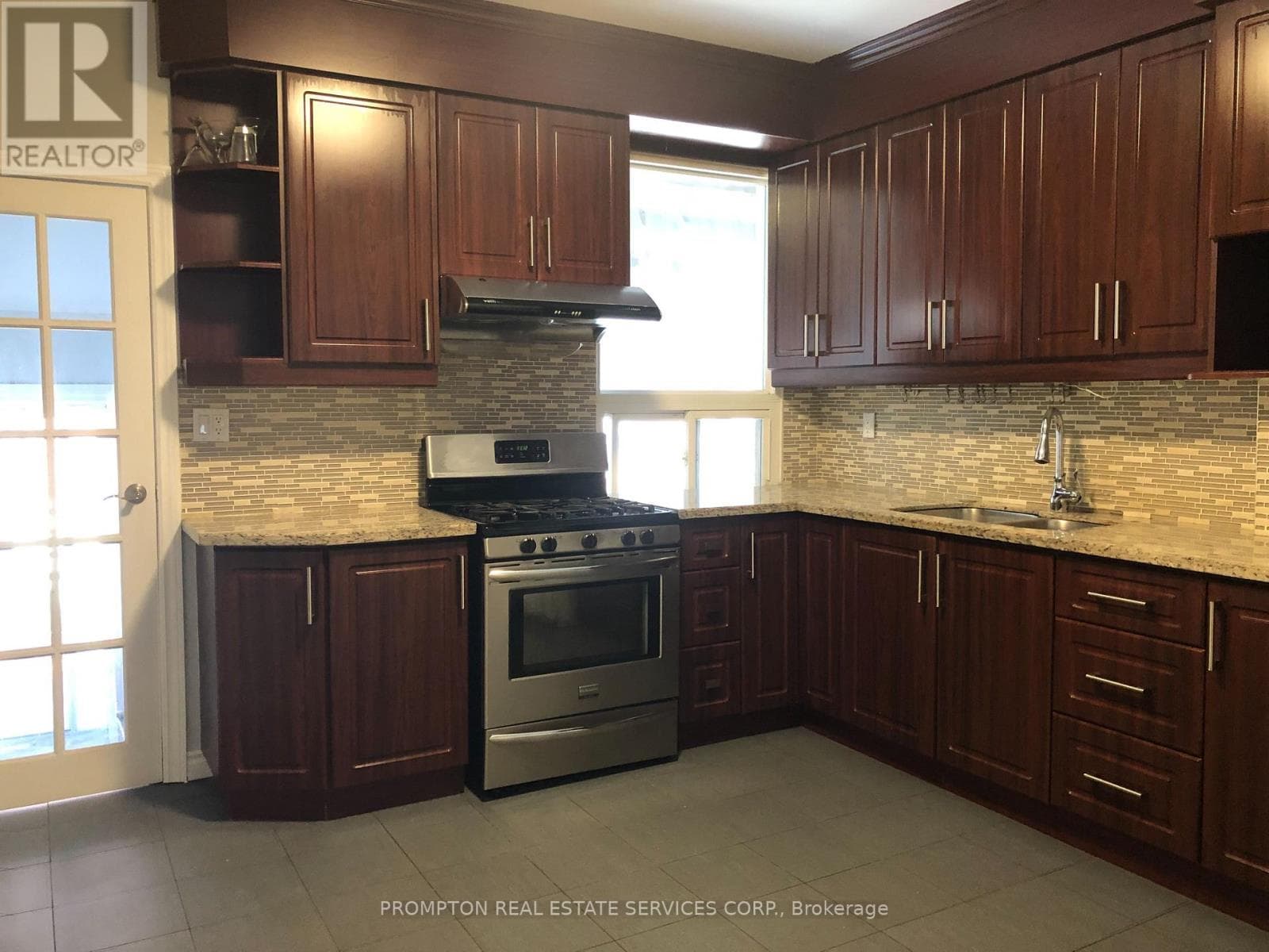 Single Family at 700 Dufferin Street, Toronto (Little Portugal), Ontario - Photo 3 - RE/MAX Garden City Realty