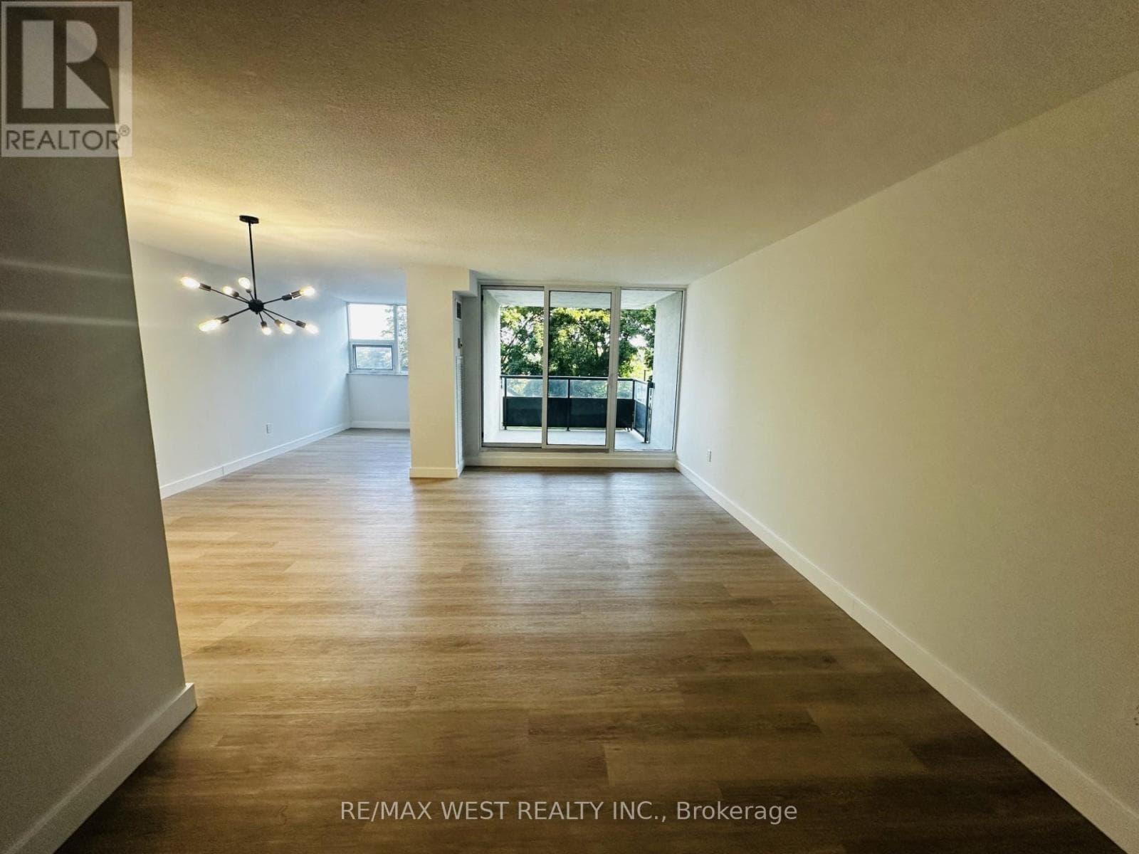 Single Family at 211- 75 Emmett Avenue, Toronto (Mount Dennis), Ontario - Photo 2 - RE/MAX Garden City Realty
