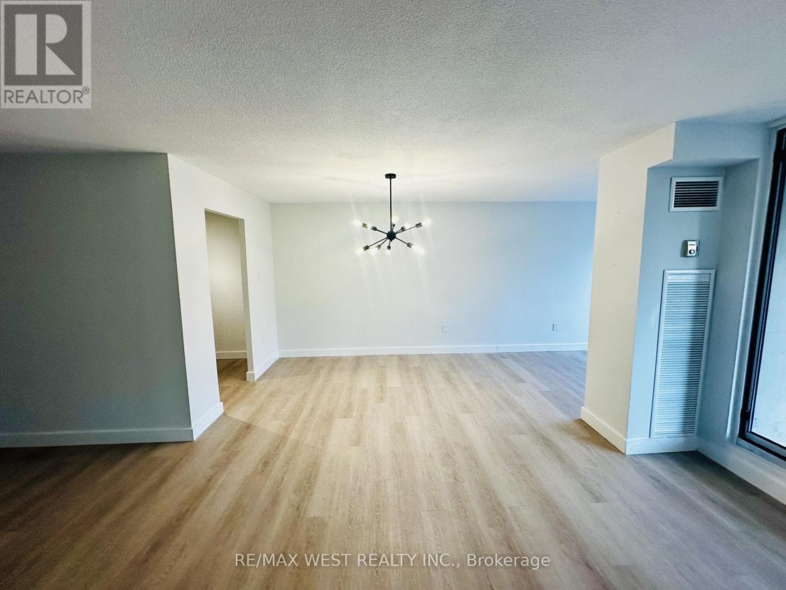 Single Family at 211- 75 Emmett Avenue, Toronto (Mount Dennis), Ontario - Photo 3 - RE/MAX Garden City Realty